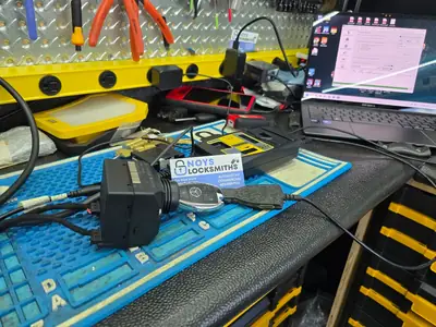 Mercedes-Benz EIS ignition module and key programmed on the bench in the Noys Locksmiths service van
